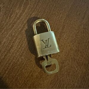 Louis Vuitton Elegant Gold Padlock and Key#309